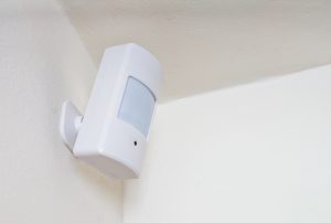 PIR Sensor alarm system mounted on wall